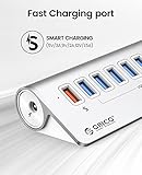 ORICO USB Hub 3.0 Powered 7 Ports Aluminum USB Hub Splitter [5Gbps] with 7 USB 3.0 Data Ports + 1 Fast Charging Ports 18W（5V/3A;9V/2A;12V/1.5A）, 12V 3A Power Adapter with 1.64Ft Cable