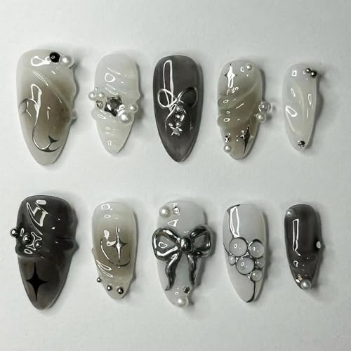 LBPEPAMZ Black Press on Nails Medium Almond Fake Nails with 3D Alloy Bow Pearl Designs Black Gradient Full Cover False Nails Water Drops Silver Star Glossy Acrylic Nails Stick on Nails for Women 24Pcs