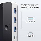 UGREEN USB 3.0 Switch 2 Computers Sharing USB C & A Devices, 4 Port USB Switcher Sharing Keyboard and Mouse, Printer/Scanner USB Switch Hub for Two Computers with 2 USB3.0 Cables and Remote