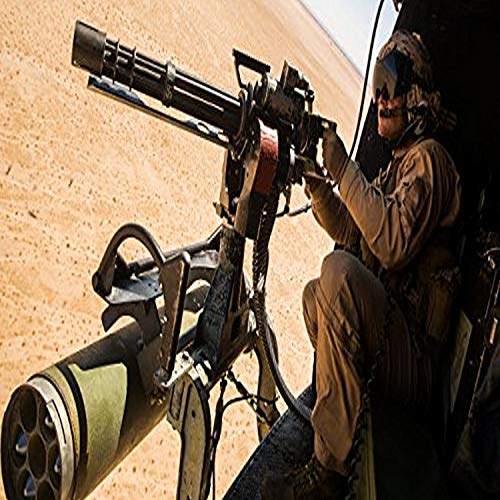 A crew chief mounts a M134 Minigun Poster Print by Stocktrek Images (34 x 22)