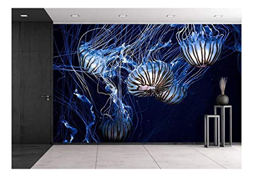 wall26 - Glowing Jellyfish Under Deep Ocean - Removable Wall Mural | Self-Adhesive Large Wallpaper - 66x96 inches